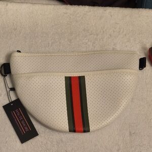 HAUTE SHORE Brett Trento White Crossbody Bag with Red and Green Stripe